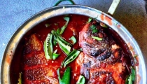 سمك بصلصة البندورة